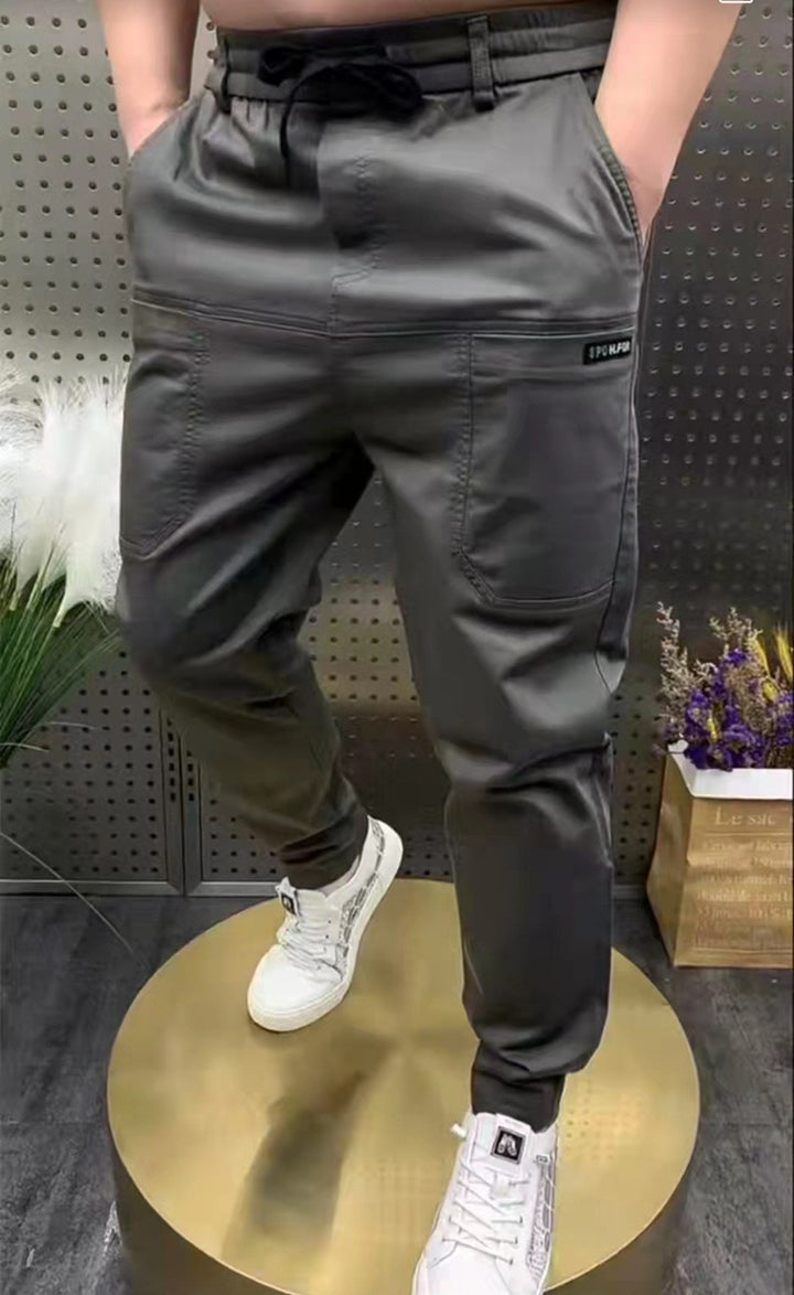 Men's sporty cargo jogger pants with elastic waistband, drawstring, and tapered leg hem StylebySassy