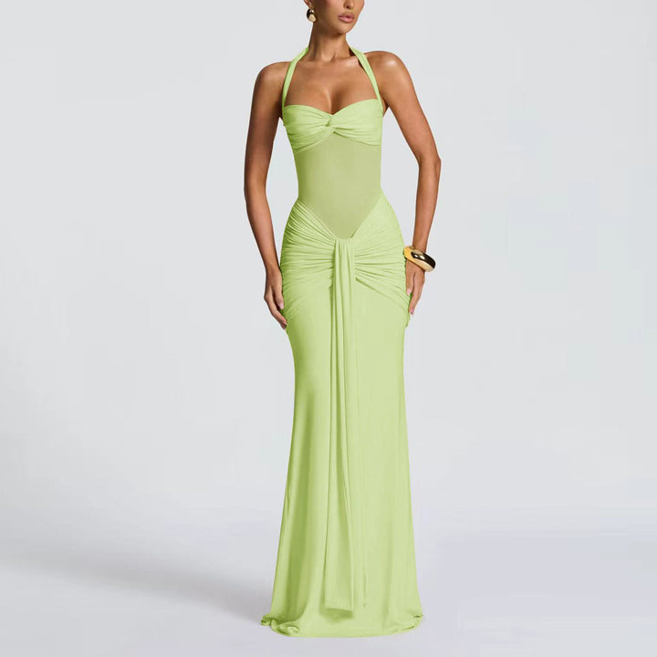 Women's figure-hugging halter evening dress with transparent mesh insert and gathered hip area StylebySassy