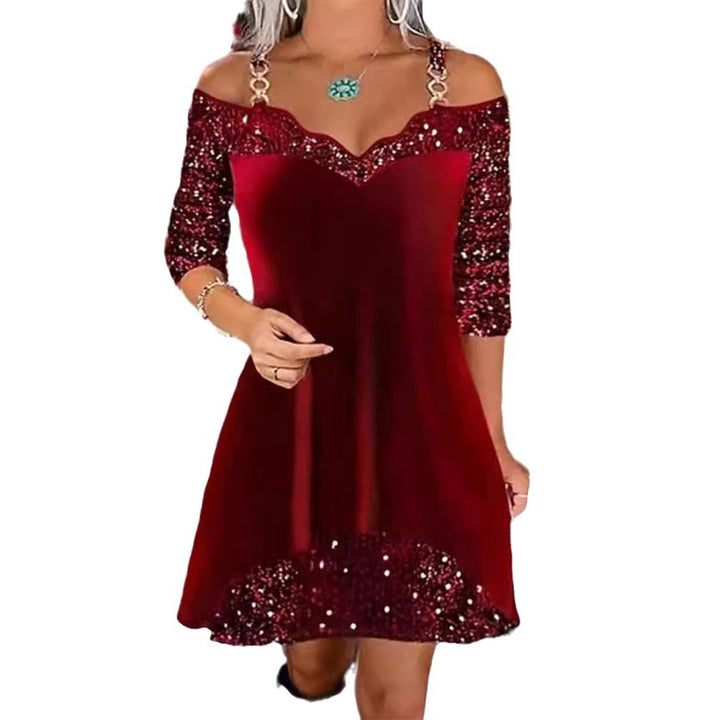 Women's off-shoulder sequin swing dress with delicate chain straps, elbow-length sleeves, and ruffle trim StylebySassy
