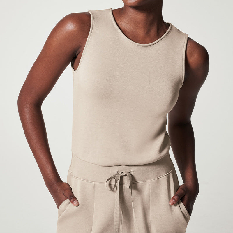 Women's sleeveless knitted jumpsuit with wide palazzo legs, drawstring waistband, and patch pockets StylebySassy