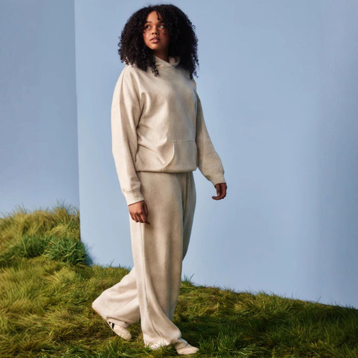 Women's oversized loungewear two-piece set with hooded sweatshirt and wide-cut sweatpants StylebySassy