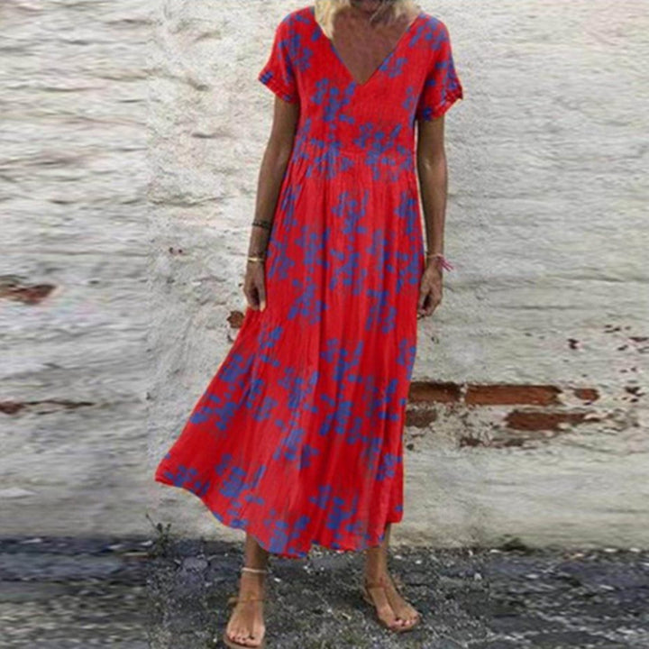 Women’s V-neck maxi dress with fine pleated skirt, empire bodice and short sleeves StylebySassy