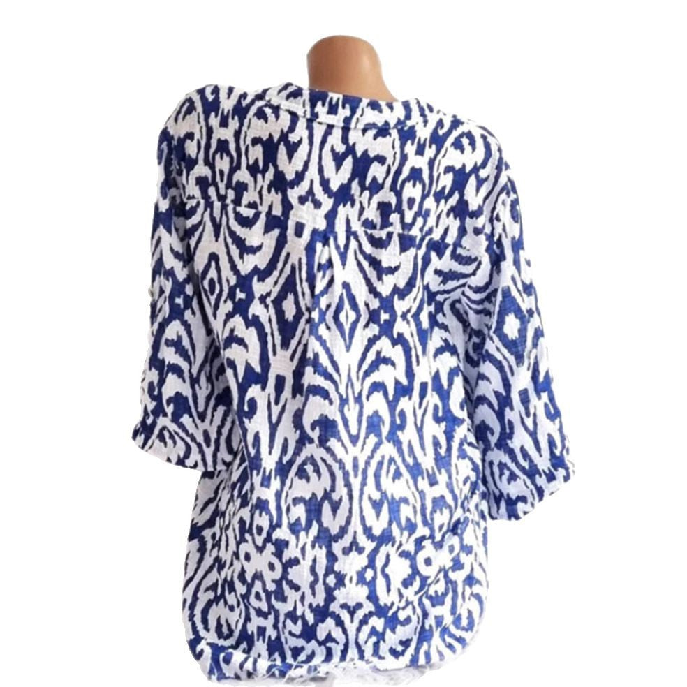 Women nan locker cut tunic blouse with Ikat pattern, V-neck and three-quarter sleeves StylebySassy