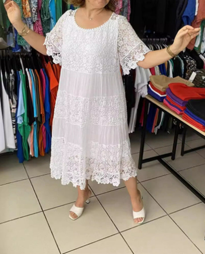 Women's multi-layered lace midi dress with pleated inserts and flounce sleeves StylebySassy