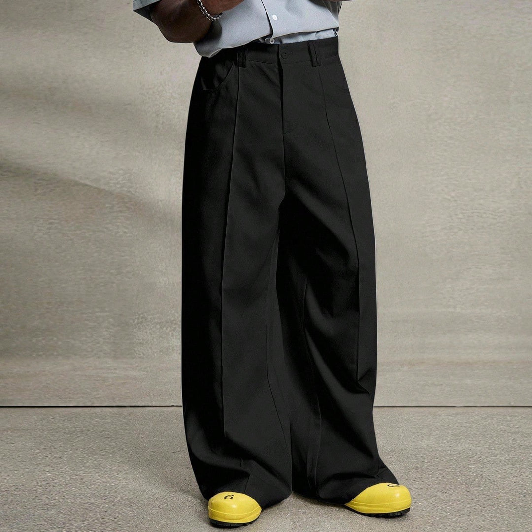 Men's wide pleated pants with high waistband, precise creases, and side inset pockets StylebySassy