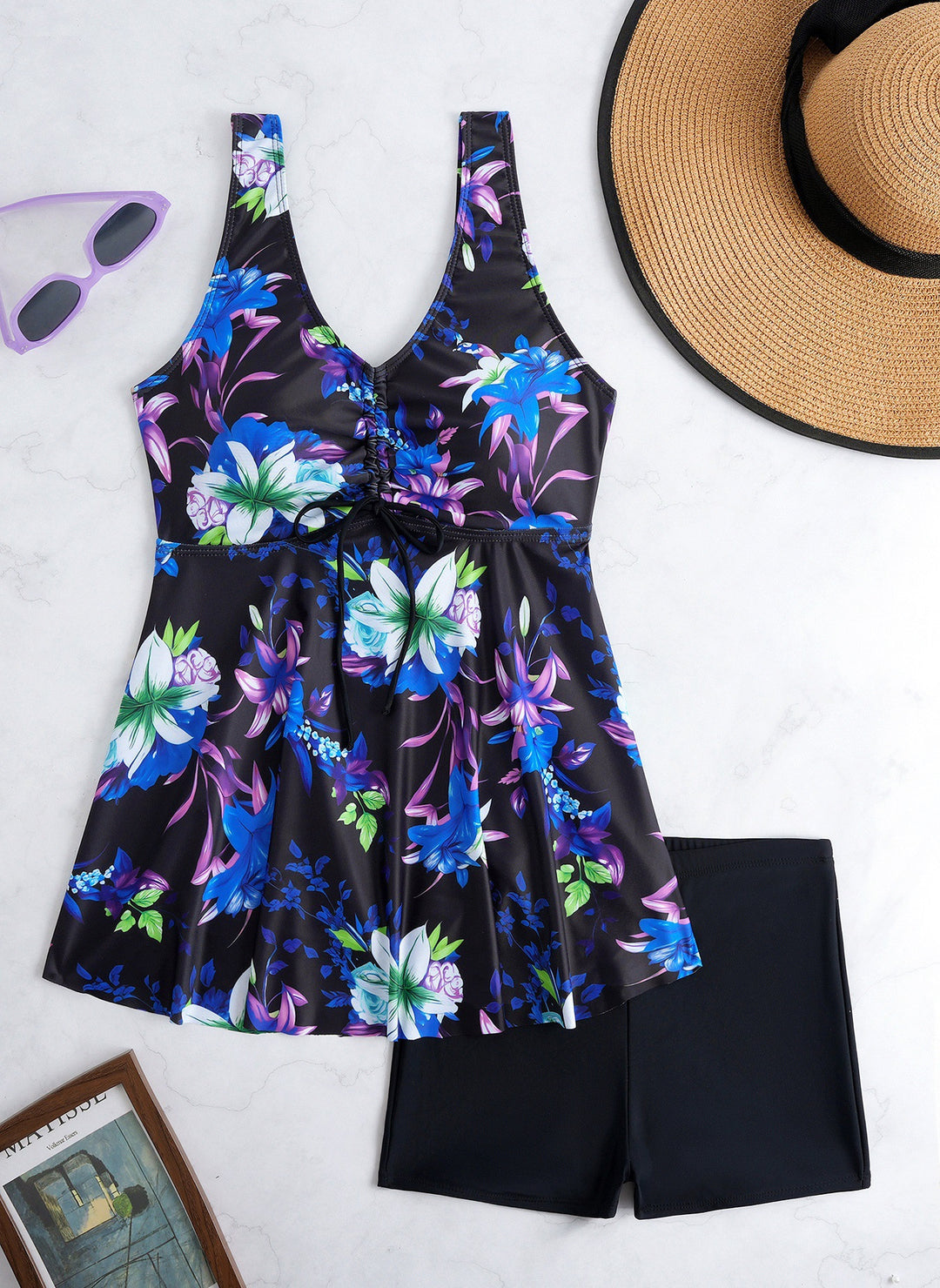Ladies' tankini set with stylish ruffle and graphic peacock pattern StylebySassy