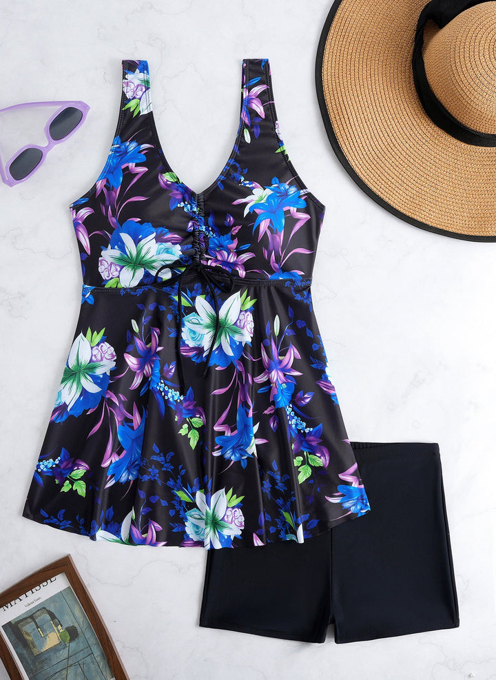 Ladies' tankini set with stylish ruffle and graphic peacock pattern StylebySassy