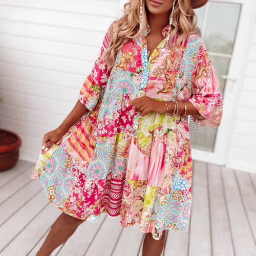 Ladies' airy tiered dress in patchwork boho style with stand collar, gathered waist seam, and three-quarter sleeves StylebySassy
