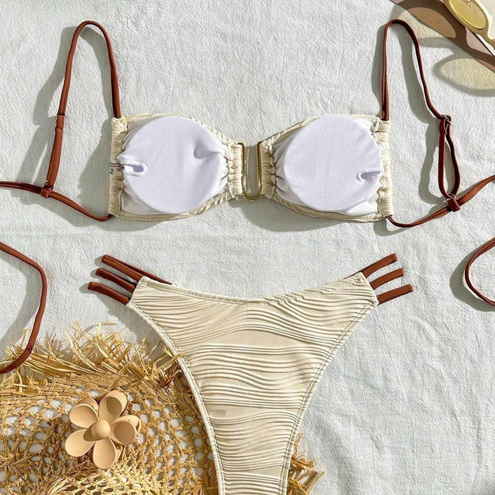 Women's triangle bikini with elegant gathering design and trendy strap details StylebySassy