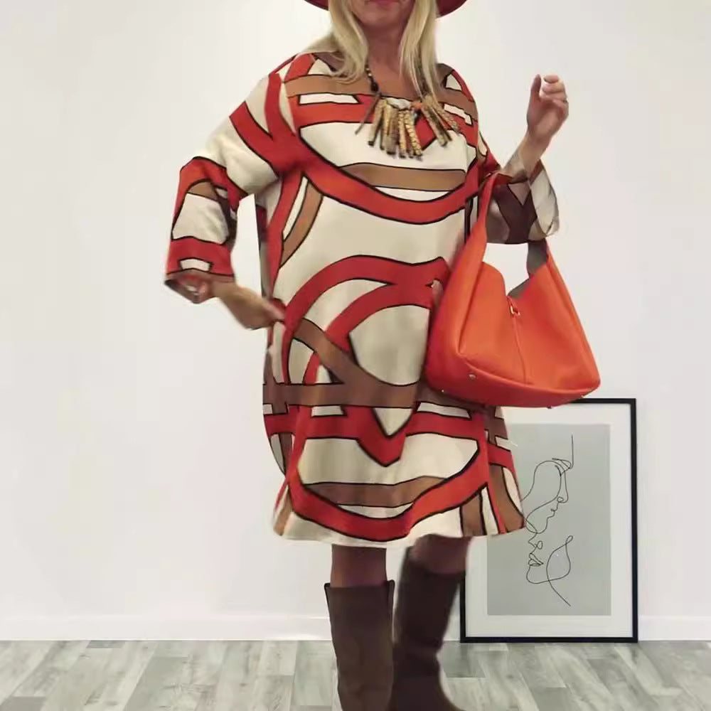 Women's generous swing dress with wide tulip hem, batwing sleeves and graphic all-over pattern StylebySassy