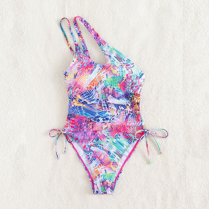 Women's one-piece swimsuit with asymmetric strap and colorful snake pattern StylebySassy