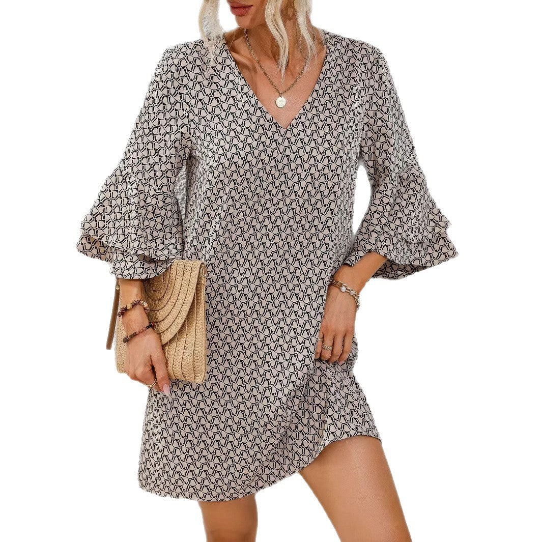 Women's flowing tunic mini dress with V-neck graphic chain pattern and double-layered bell sleeves StylebySassy