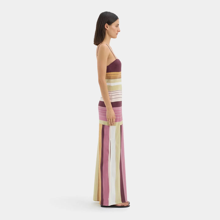 Women's figure-hugging maxi dress with spaghetti straps, straight neckline, panel stripes, and side slit StylebySassy