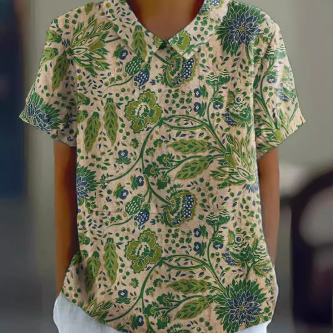 Women's casual short-sleeve blouse with V-neck, rounded hem, and botanical all-over print StylebySassy