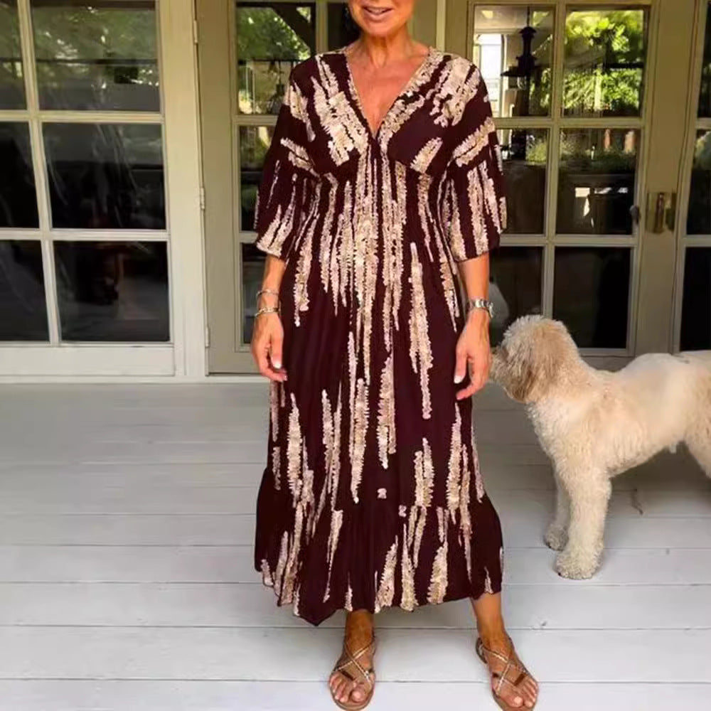 Ladies' V-neck maxi dress with brushstroke pattern, gathered underbust, balloon sleeves, and ruffled tiers StylebySassy