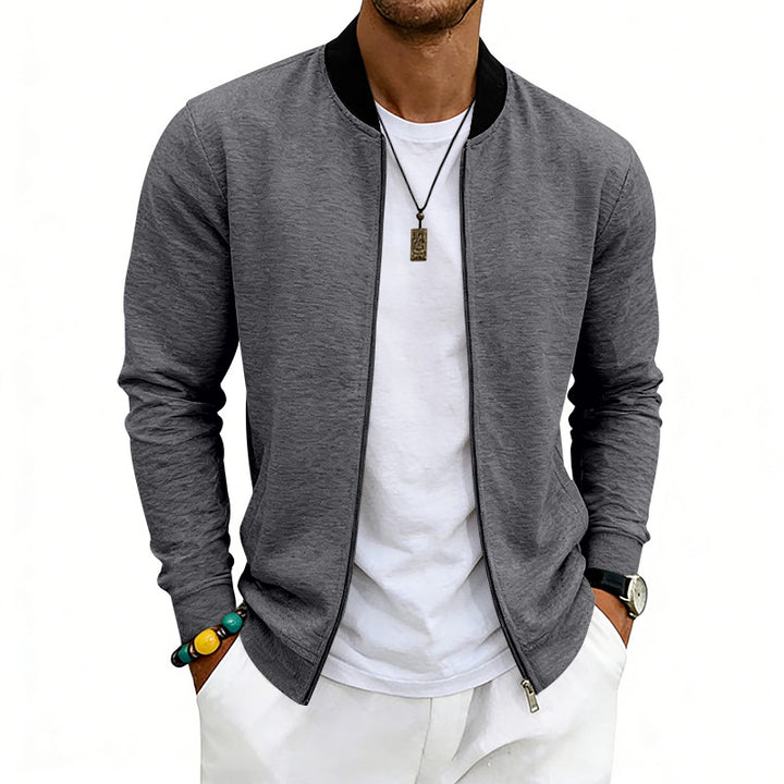 Men's lightweight bomber jacket made of jersey with stand-up collar, elastic cuffs, and concealed pockets StylebySassy