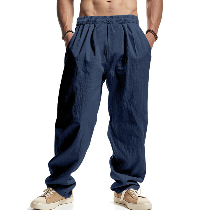 Men's loose leisure pants with elastic waistband, drawstring, and deep side pockets StylebySassy