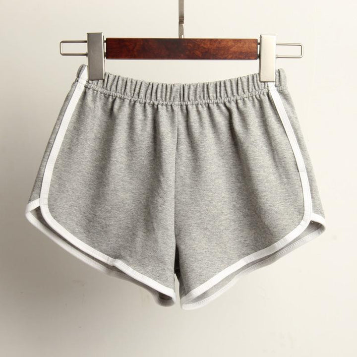 Women's sporty shorts with elastic waistband and contrasting stripes StylebySassy