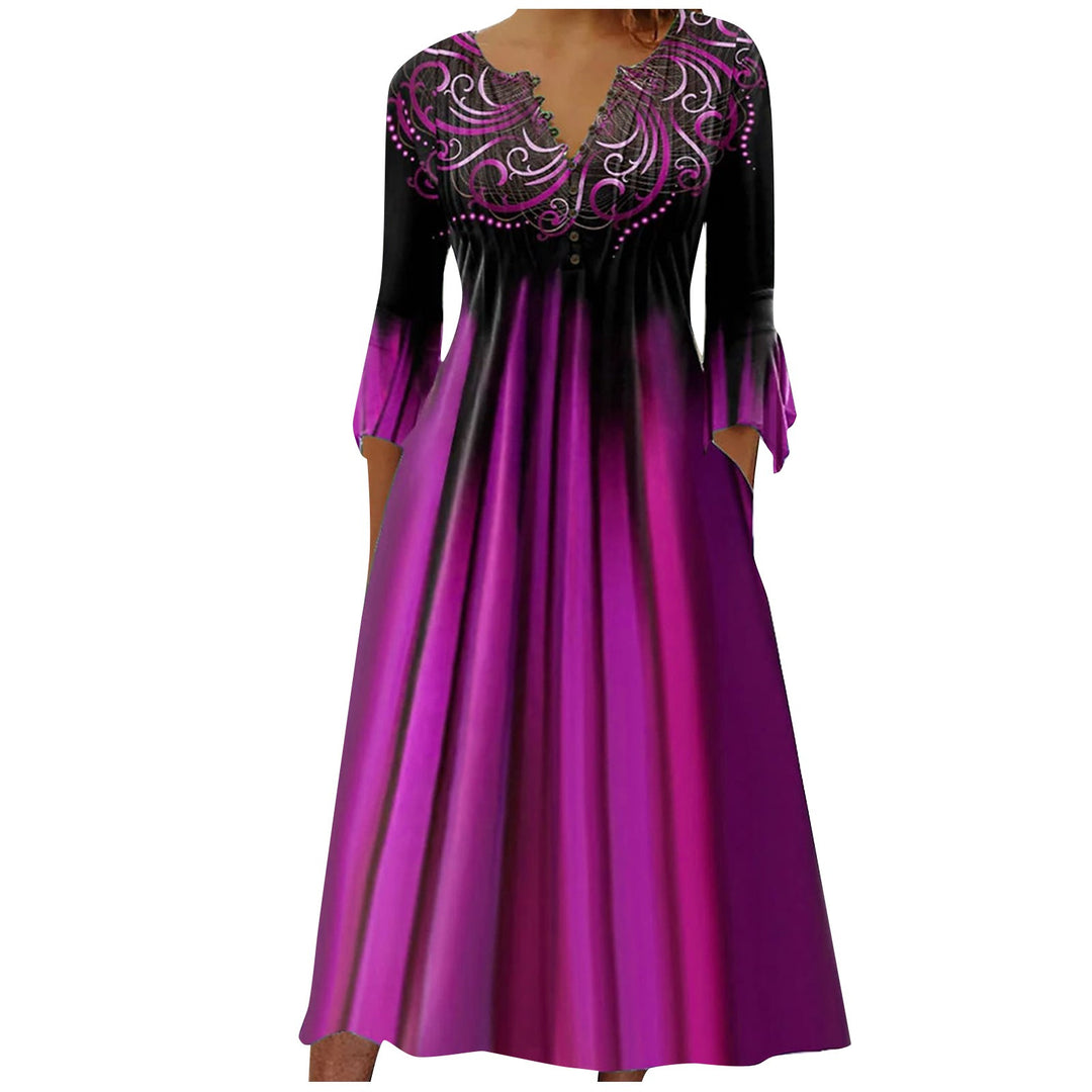 Women's flowing maxi dress with embellished V-neck, underbust seam, flared skirt and side pockets StylebySassy