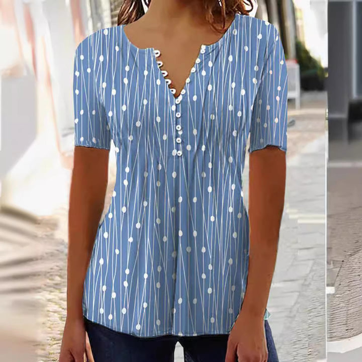 Women's airy V-neck blouse with short sleeves, decorative button placket and graphic dot stripe pattern StylebySassy