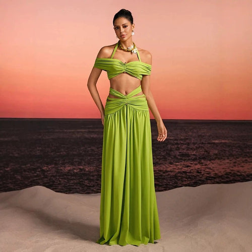 Women's maxi dress with sophisticated cut-out and decorative draping