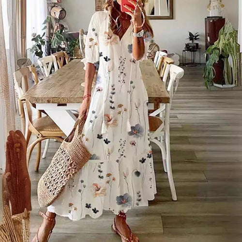 Women’s airy maxi dress in A-line with V-neck, casual rolled sleeves and floral all-over print StylebySassy