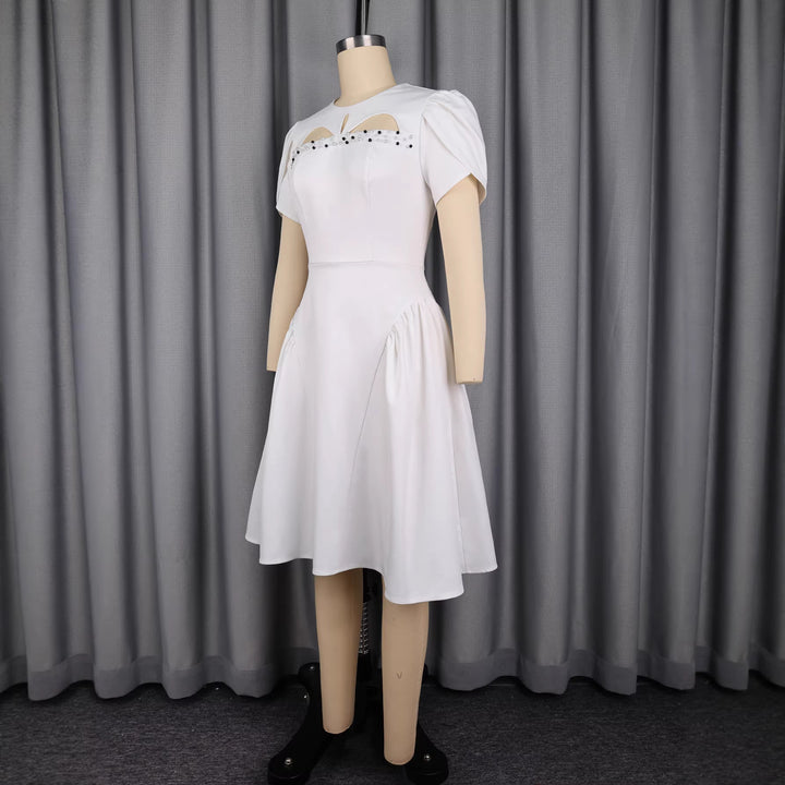 Ladies evening dress with voluminous puff sleeves and refined cut-outs