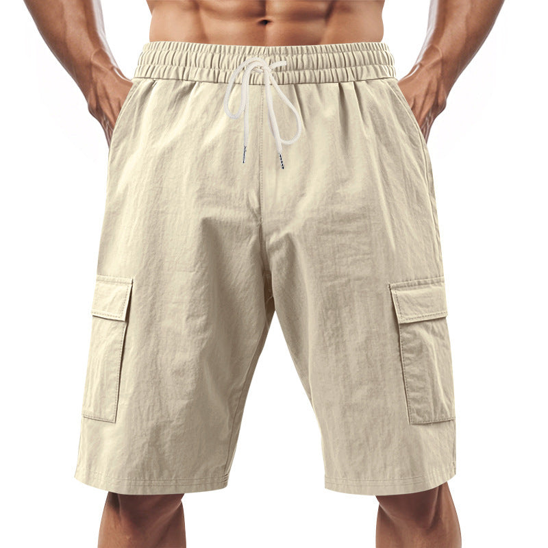 Men's technical cargo shorts with elastic drawstring waistband, secure flap pockets, and quick-drying functional material StylebySassy