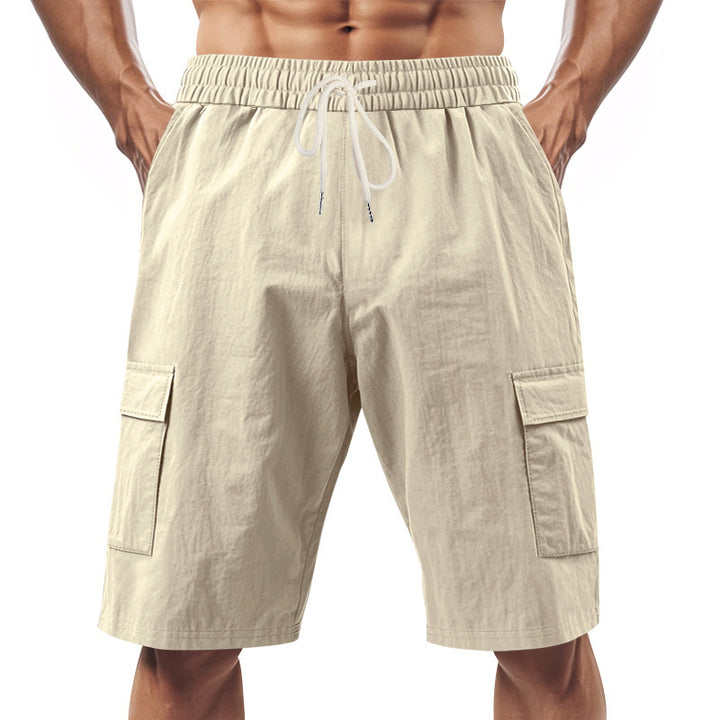 Men's technical cargo shorts with elastic drawstring waistband, secure flap pockets, and quick-drying functional material StylebySassy