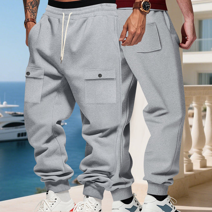 Men's cargo joggers with flap pockets, drawstring waistband, and ribbed ankle cuffs StylebySassy