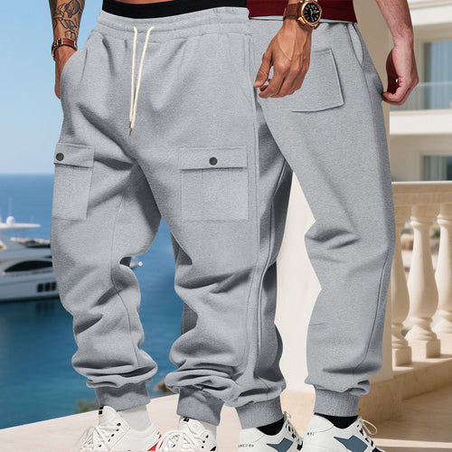 Men's cargo joggers with flap pockets, drawstring waistband, and ribbed ankle cuffs StylebySassy