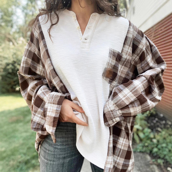 Women's checkered flannel overshirt with patch chest pocket, roll-up sleeves, and relaxed oversized fit StylebySassy