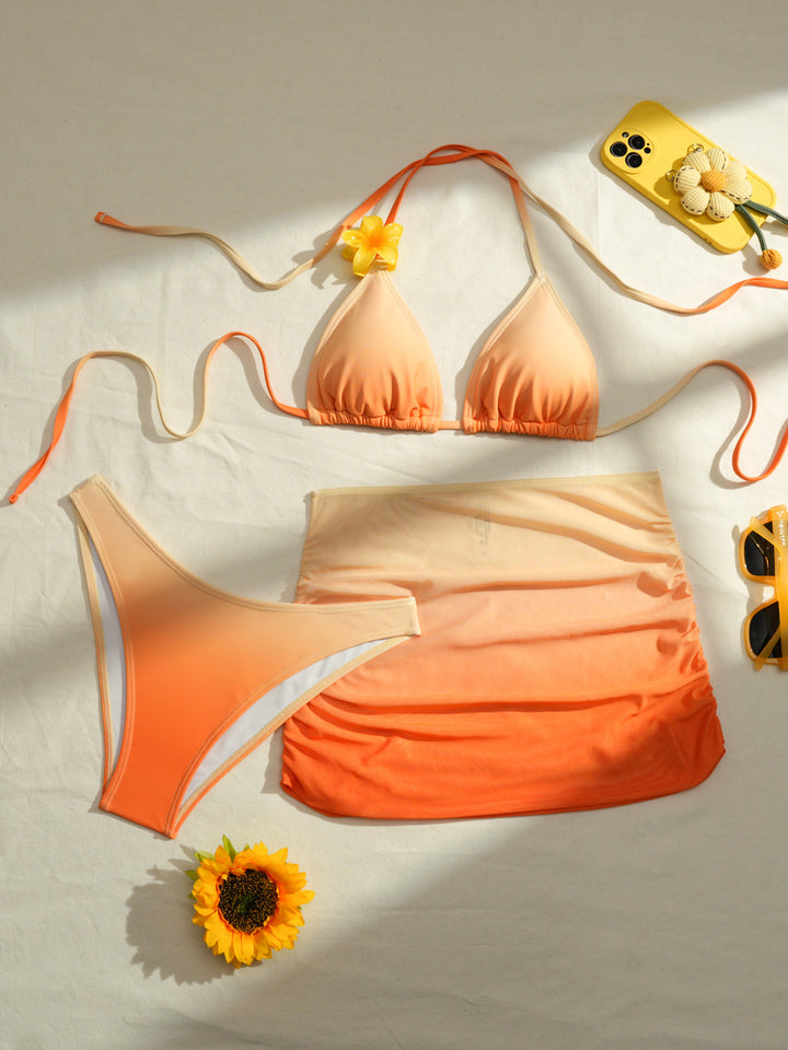 Women Triangle Bikini Set with Floral Detail and Wrap Skirt StylebySassy