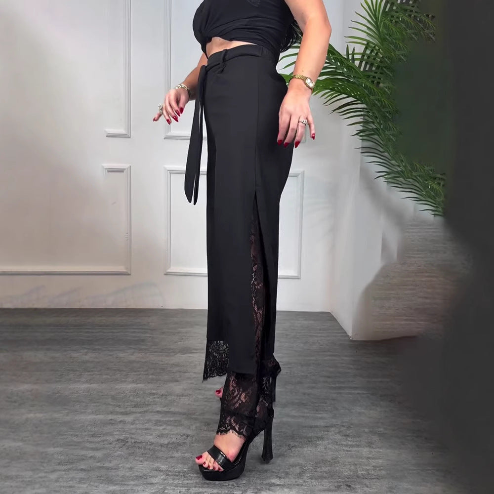 Women high-waisted tailored trousers with side slit, transparent lace underlay and tie belt StylebySassy