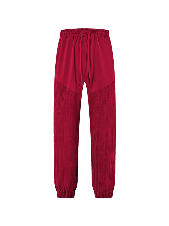 Men's slim-fit jogging pants with elastic drawstring waistband and textured knee panel StylebySassy