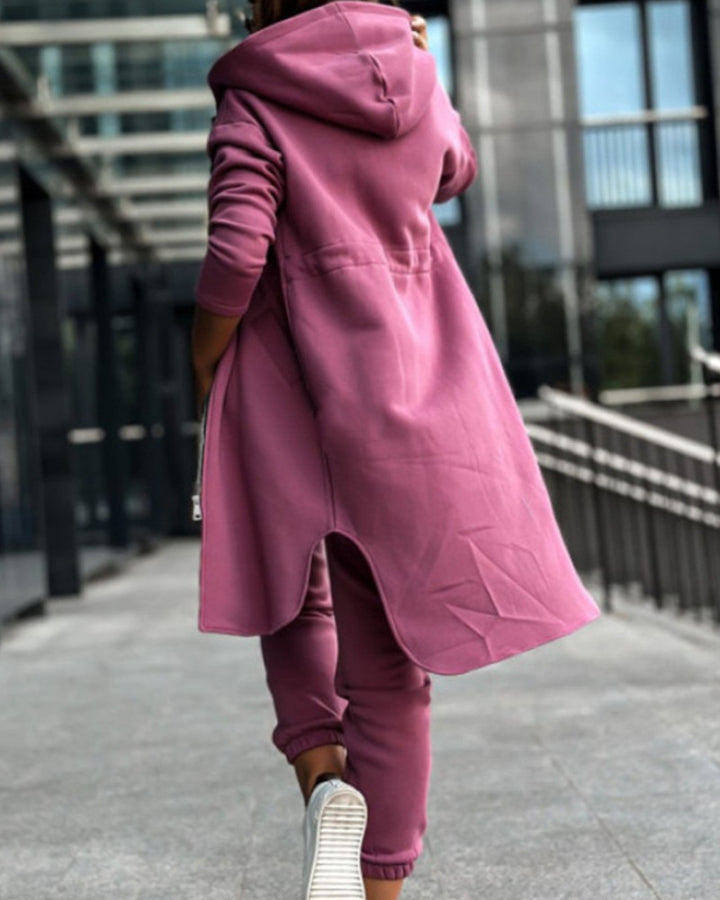 Women's long sweat hoodie jacket with two-way zipper, drawstring waist, side pockets, and side slits StylebySassy