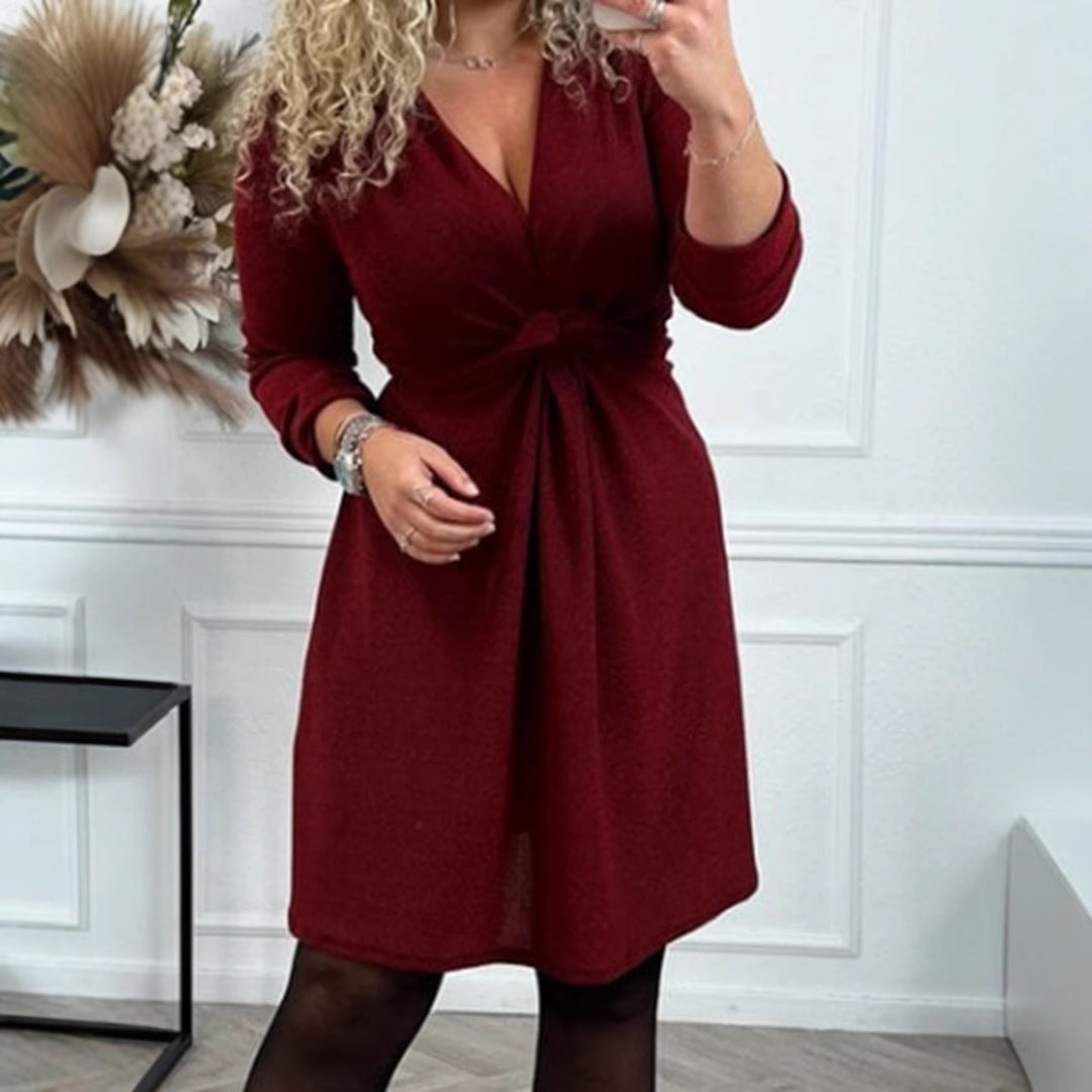 Women's knee-length V-neck dress with gathered waistband made of lightweight glossy knit StylebySassy