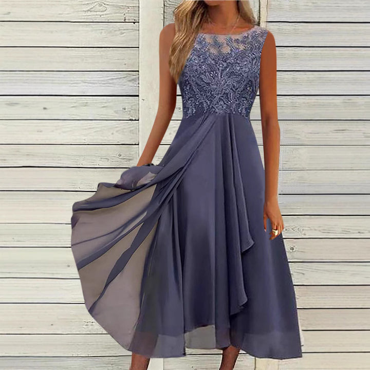 Women's sleeveless chiffon midi dress with embroidered illusion lace, boat neckline, and multilayer flared skirt StylebySassy