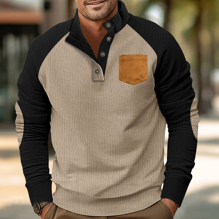 Men's structured half-button knit pullover in cord look with raglan sleeves, front chest pocket, and elbow patches StylebySassy