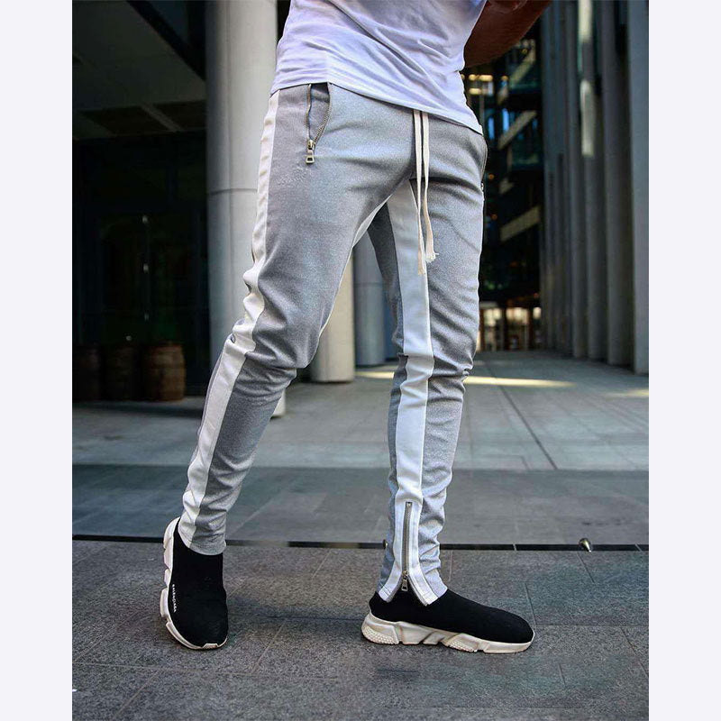 Men's narrow jogging pants with side contrast stripe, drawstring and ankle zipper StylebySassy