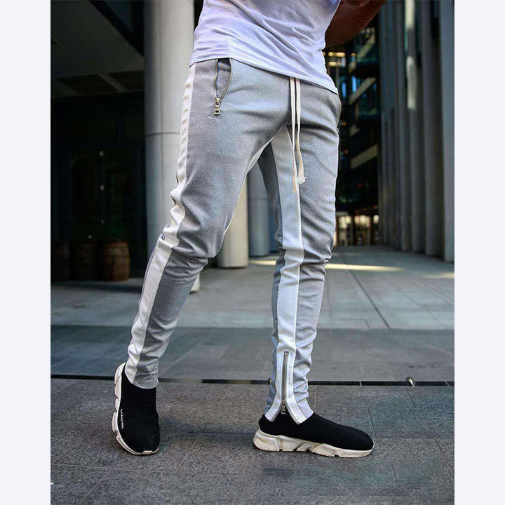 Men's narrow jogging pants with side contrast stripe, drawstring and ankle zipper StylebySassy