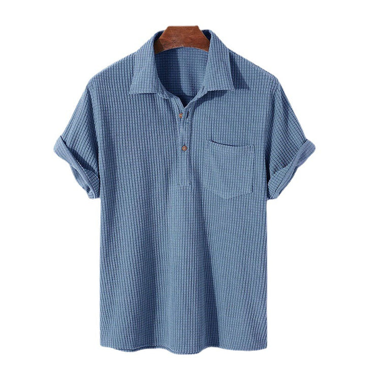 Men's waffle knit polo with shirt collar, short button placket and chest pocket StylebySassy