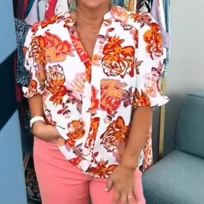 Ladies nan loose blouse with gathered puff sleeves and button placket StylebySassy