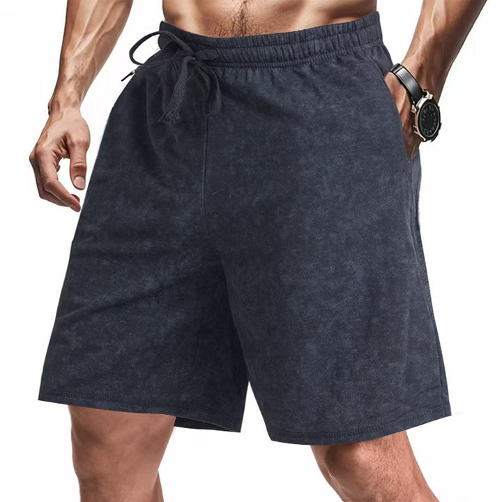 Men's lightly fitted terry shorts with elastic waistband, drawstring and side pockets StylebySassy