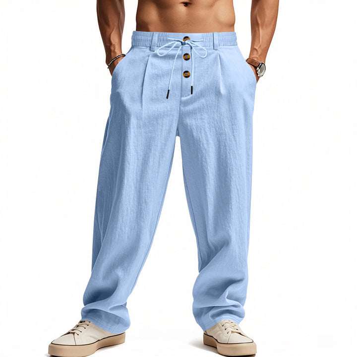 Men's casual pleated pants in linen look with elastic tunnel drawstring, decorative button placket, and deep side pockets StylebySassy