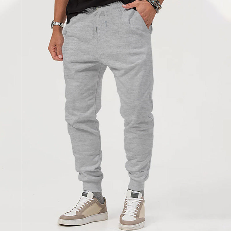 Men's jersey sweatpants in a tapered cut with concealed drawstring and shape-stable ankle cuffs StylebySassy