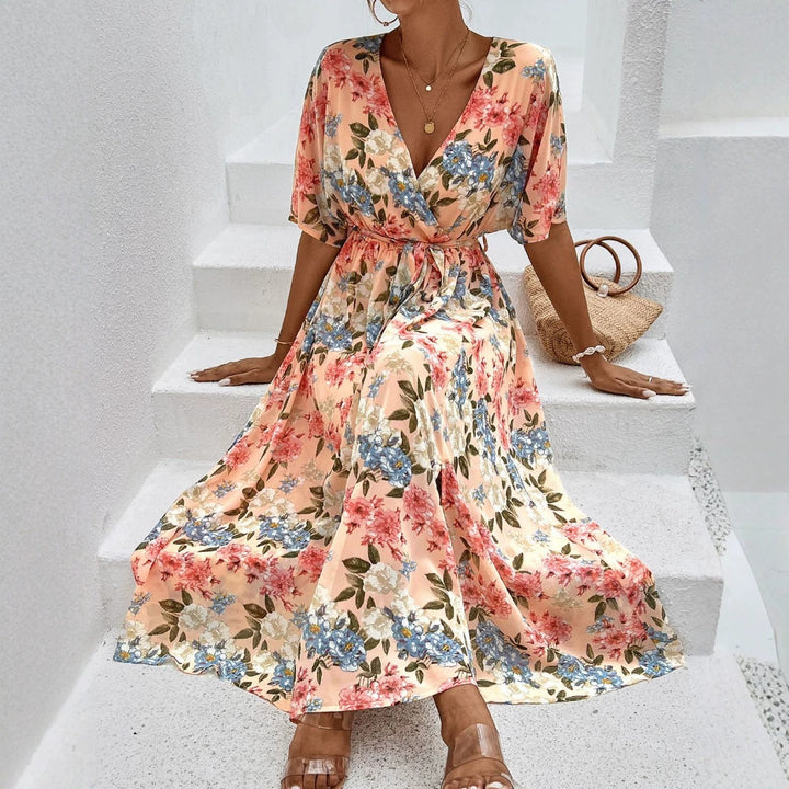 Women's floral V-neck tie dress with fitted belt and side leg slit StylebySassy