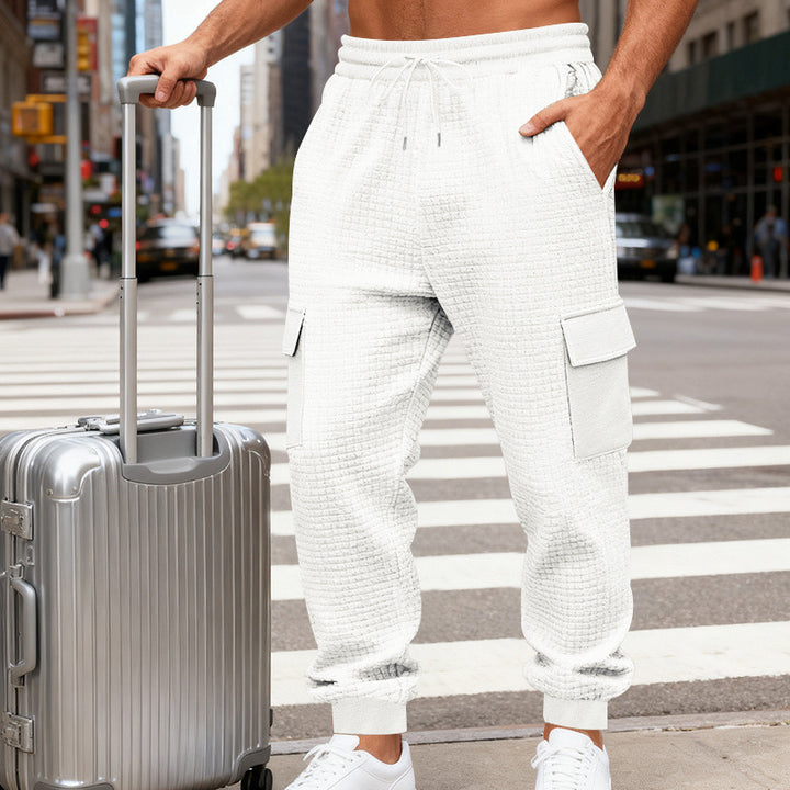 Men's waffle texture cargo pants in jogging style with flap pockets and elastic waistband StylebySassy