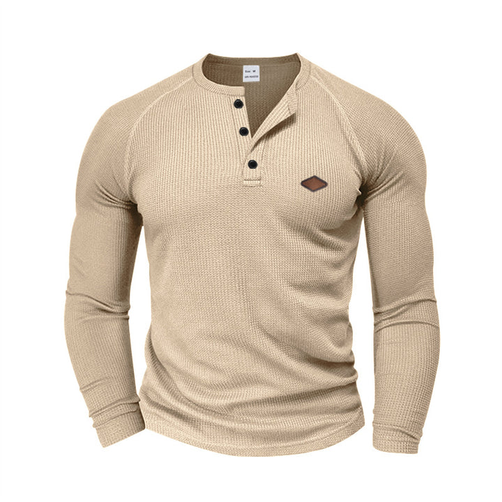 Men's structured waffle Henley shirt with short button placket, raglan sleeves, and leather patch StylebySassy