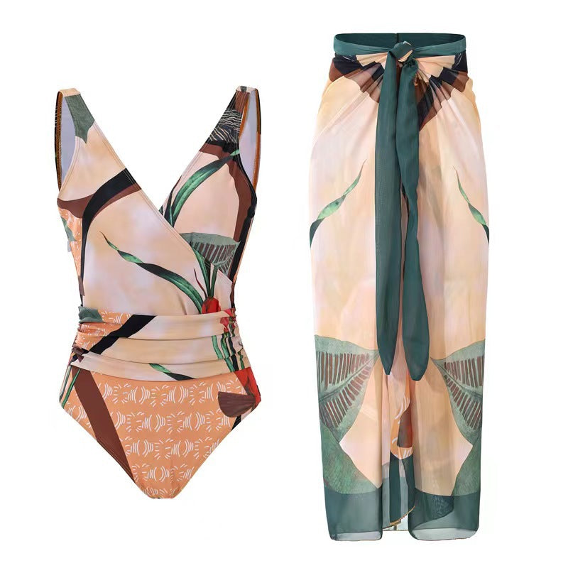 Women Elegant Wrap Swimsuit with Floral Designs and Matching Overlay Skirt StylebySassy